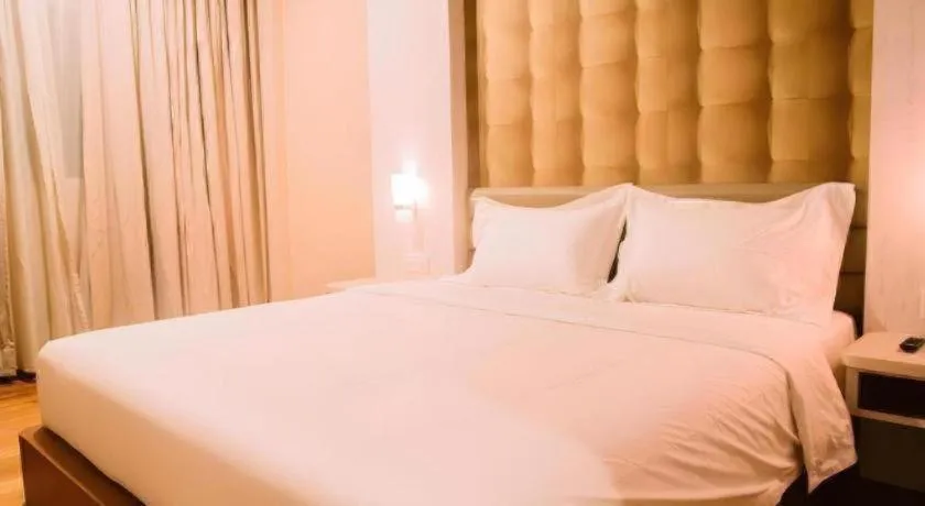 Bed in The Golden Bay Hotel Batam