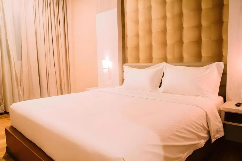 Bed in The Golden Bay Hotel Batam