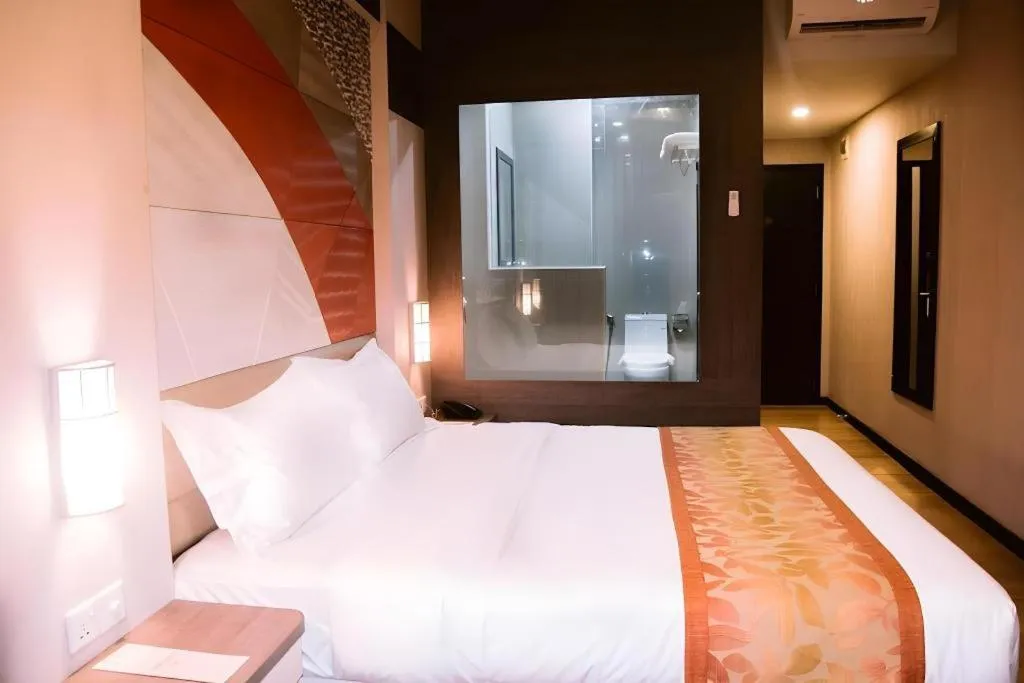 Bed in The Golden Bay Hotel Batam
