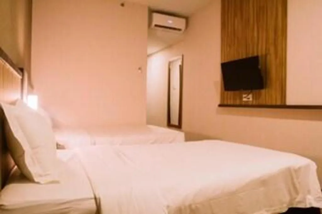 Bed in The Golden Bay Hotel Batam