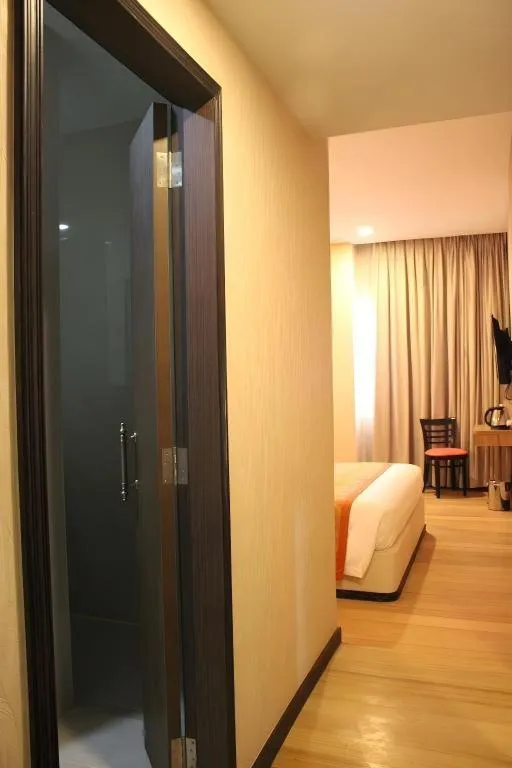 Bed in The Golden Bay Hotel Batam