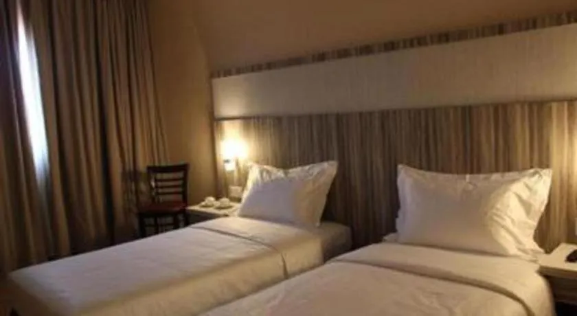 Bed in The Golden Bay Hotel Batam