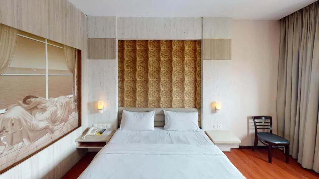 Bed in The Golden Bay Hotel Batam
