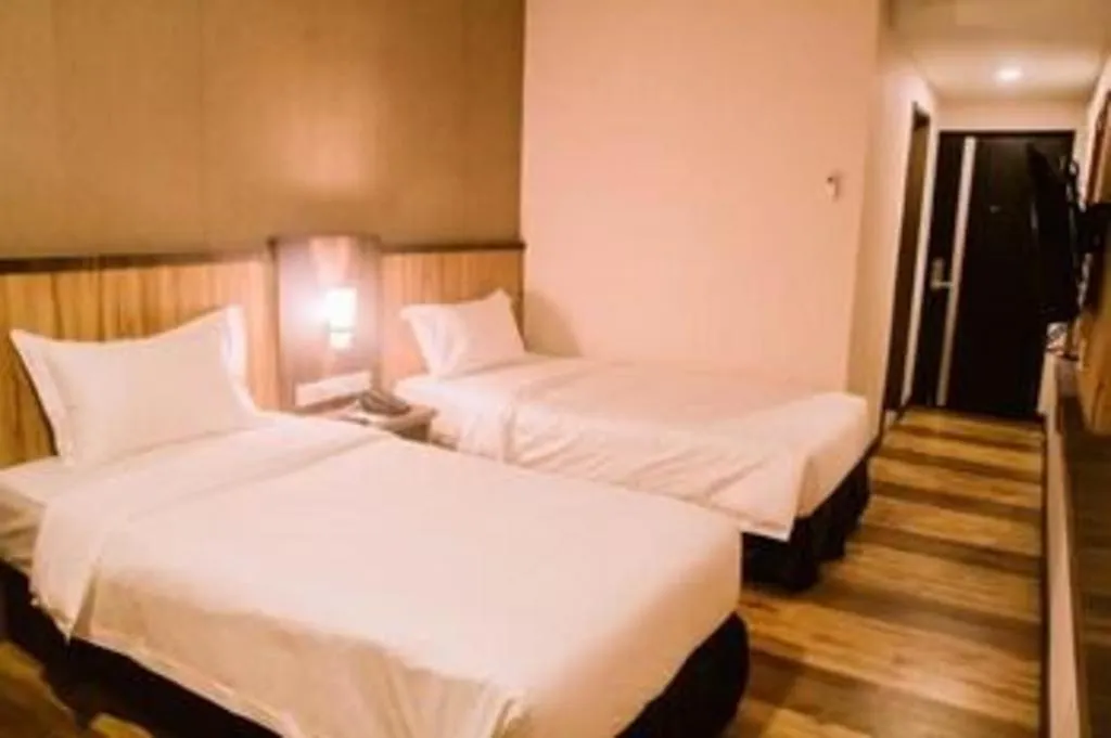 Bed in The Golden Bay Hotel Batam