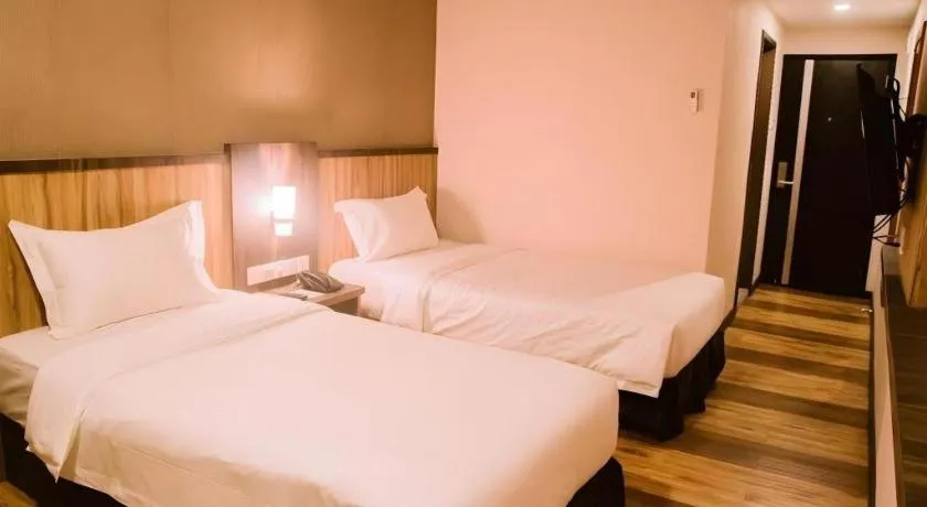 Bed in The Golden Bay Hotel Batam