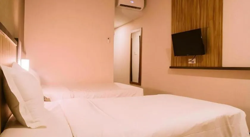 Bed in The Golden Bay Hotel Batam