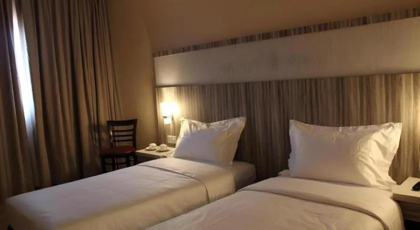 Bed in The Golden Bay Hotel Batam