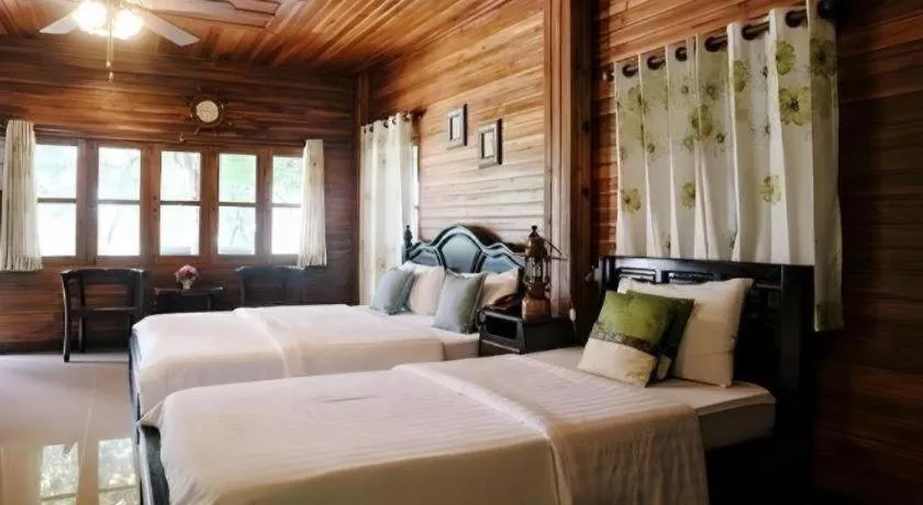 Bed in Ban Noi Resort Phrae