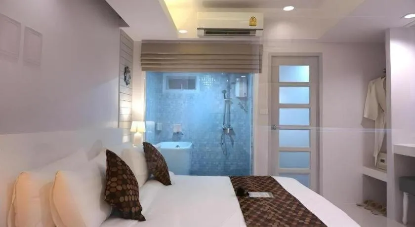 Bed in NanNakara Boutique Hotel