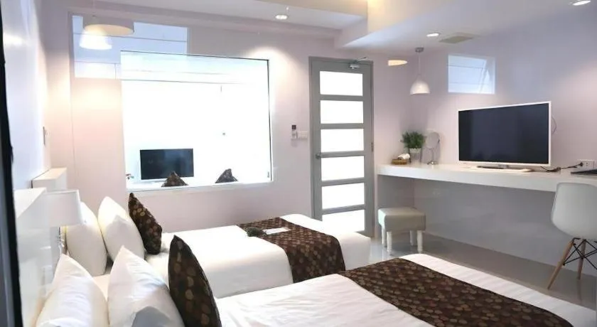 Bed in NanNakara Boutique Hotel