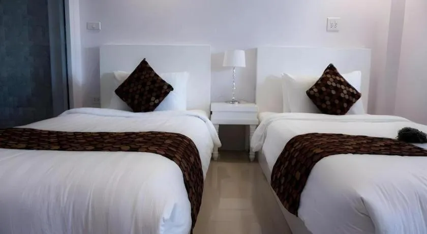 Bed in NanNakara Boutique Hotel