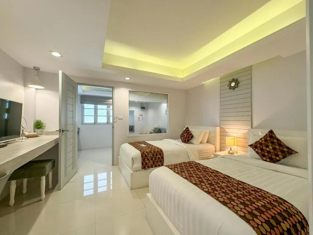 Bed in NanNakara Boutique Hotel
