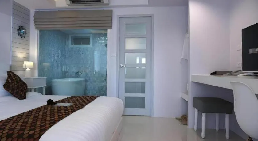 Bed in NanNakara Boutique Hotel
