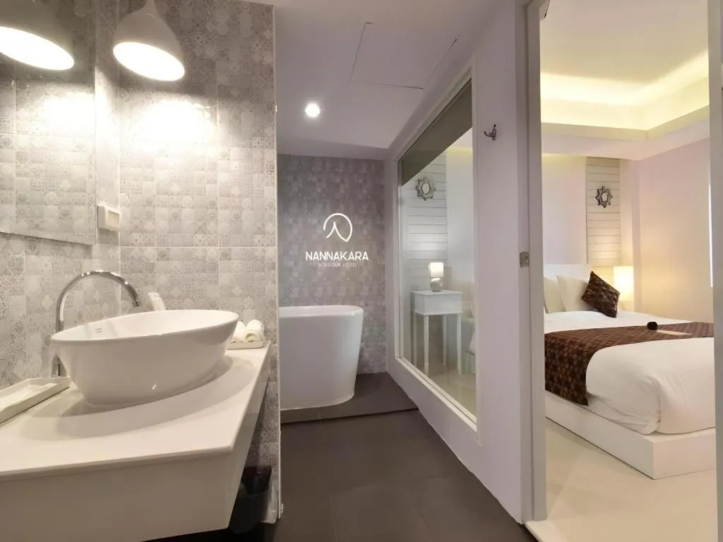 Bed in NanNakara Boutique Hotel