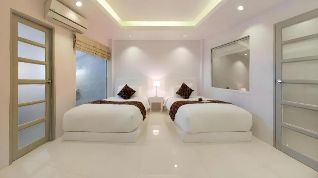 Bed in NanNakara Boutique Hotel