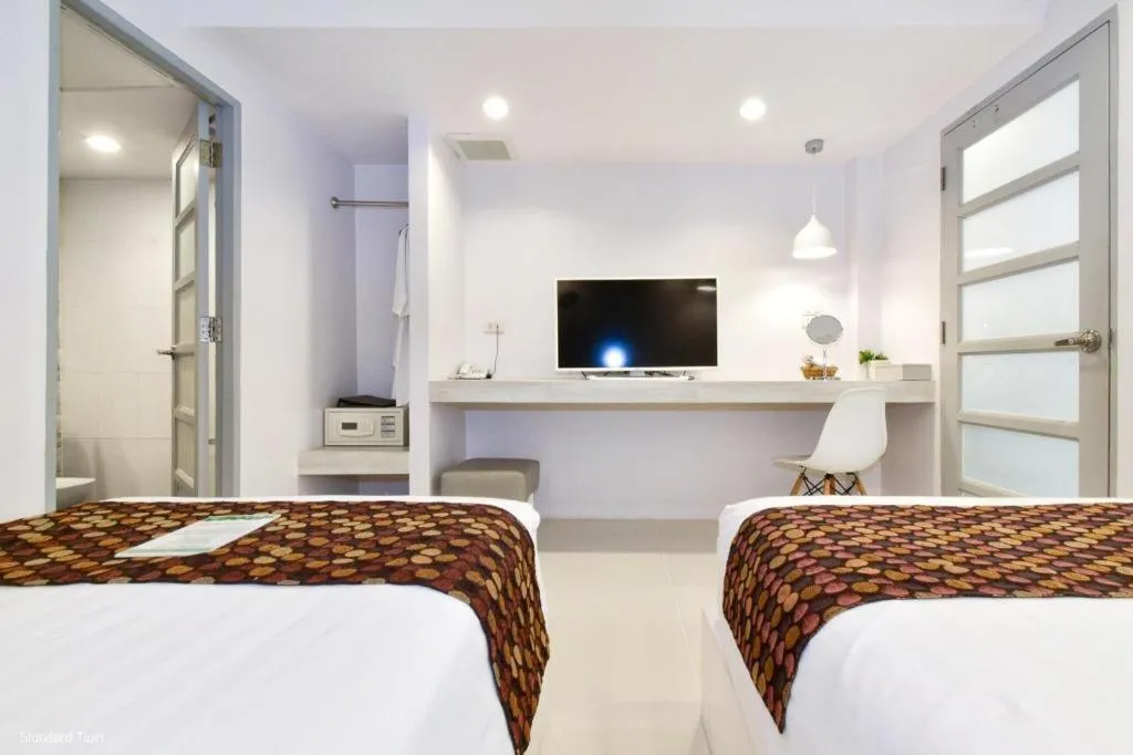 Bed in NanNakara Boutique Hotel