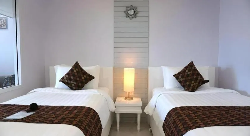 Bed in NanNakara Boutique Hotel