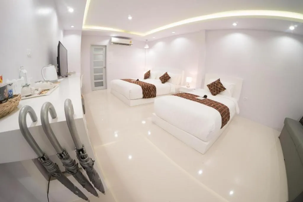 Bed in NanNakara Boutique Hotel