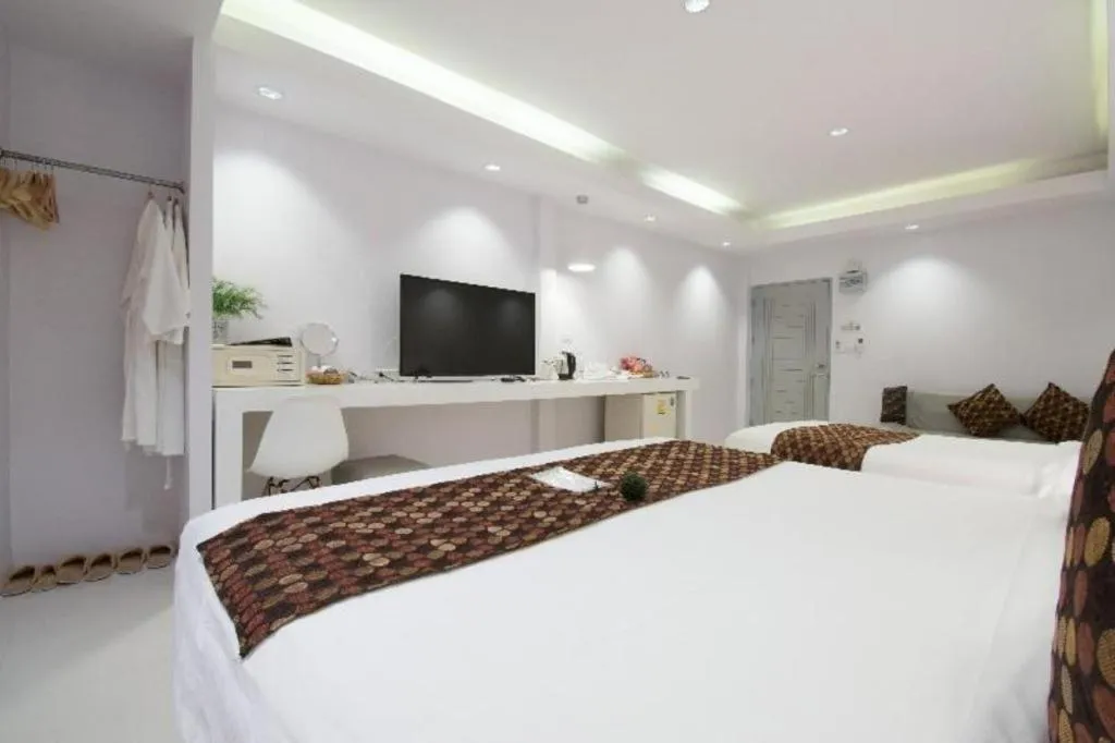 Bed in NanNakara Boutique Hotel