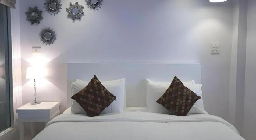 Bed in NanNakara Boutique Hotel