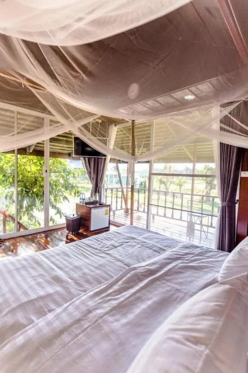 Bed in The White House Boutique Resort