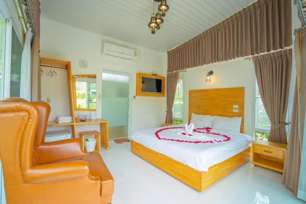 Bed in The White House Boutique Resort