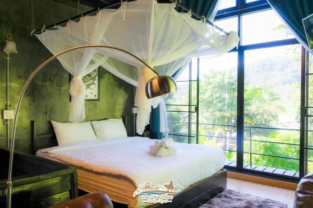 Bed in The White House Boutique Resort