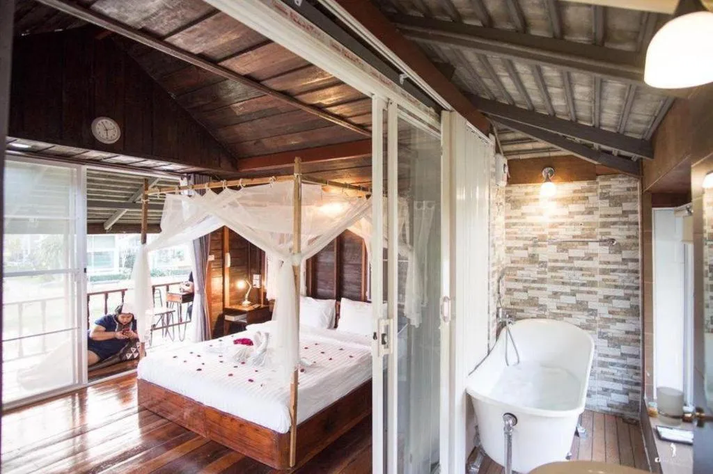 Bed in The White House Boutique Resort