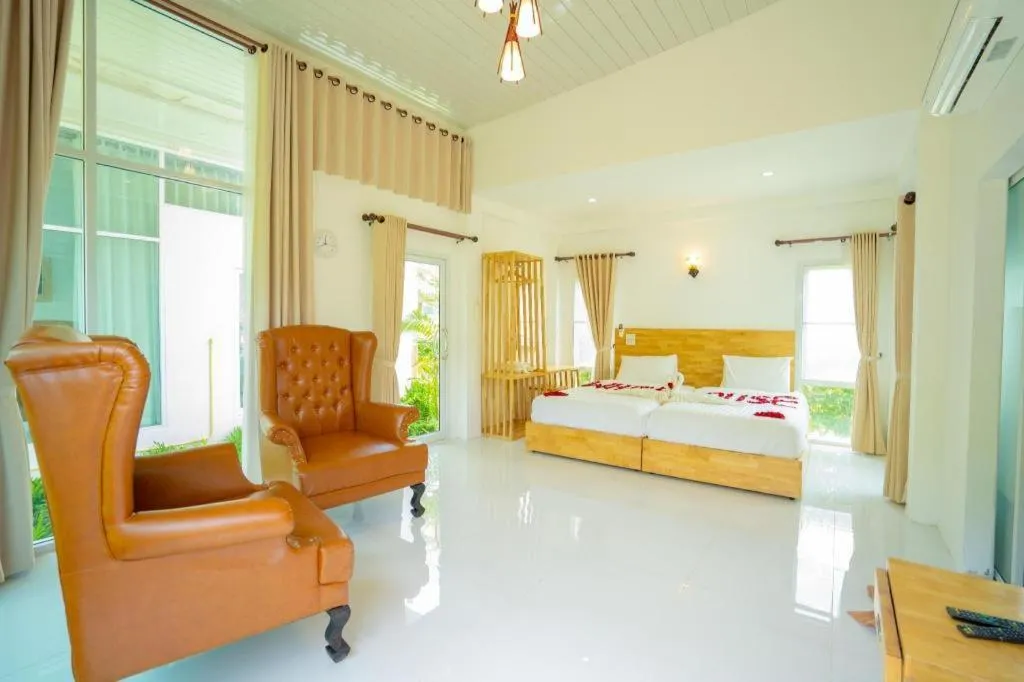 Bed in The White House Boutique Resort