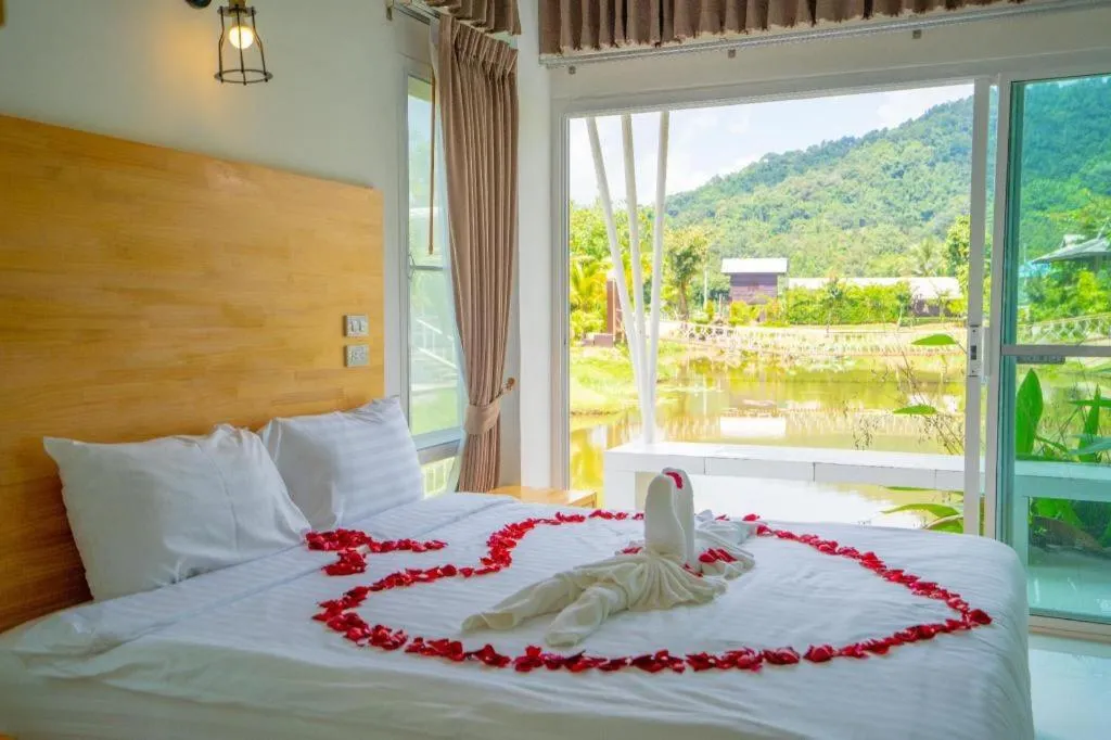 Bed in The White House Boutique Resort