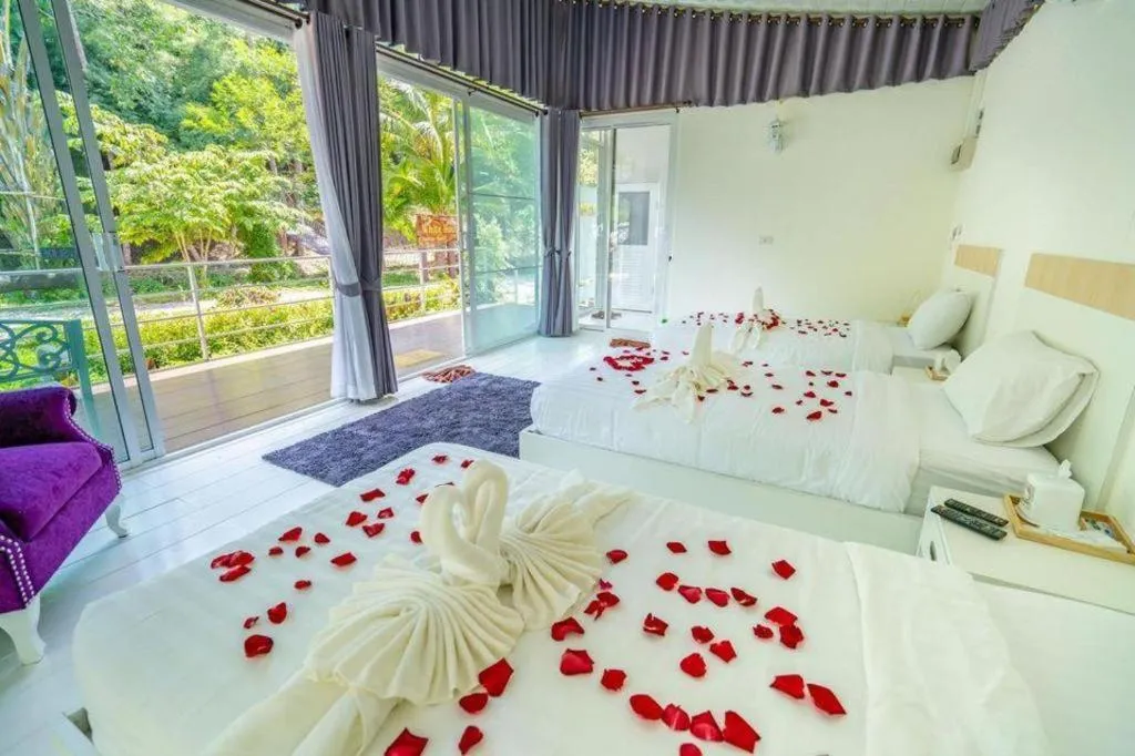 Bed in The White House Boutique Resort