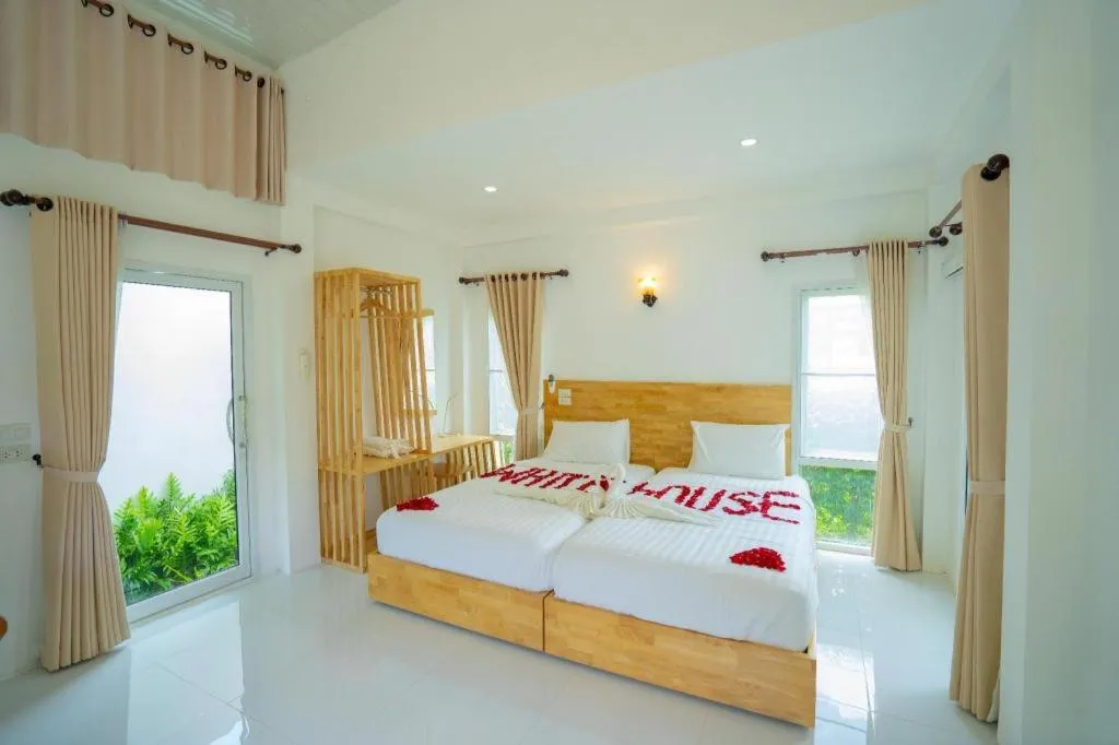 Bed in The White House Boutique Resort