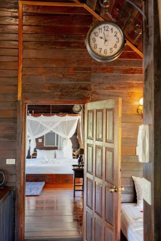 Bed in The White House Boutique Resort