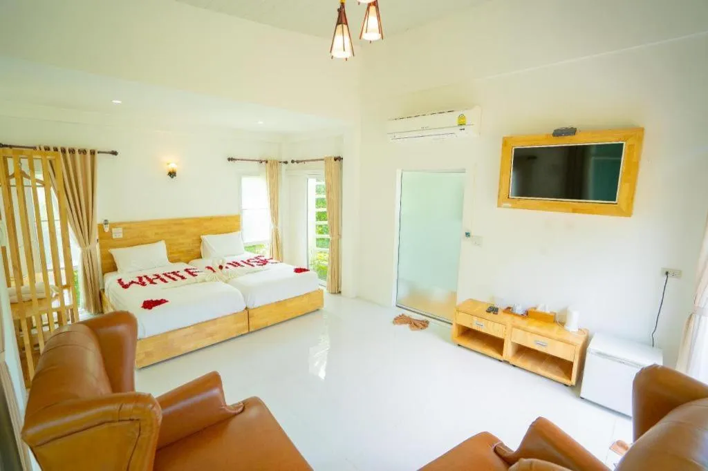 Bed in The White House Boutique Resort