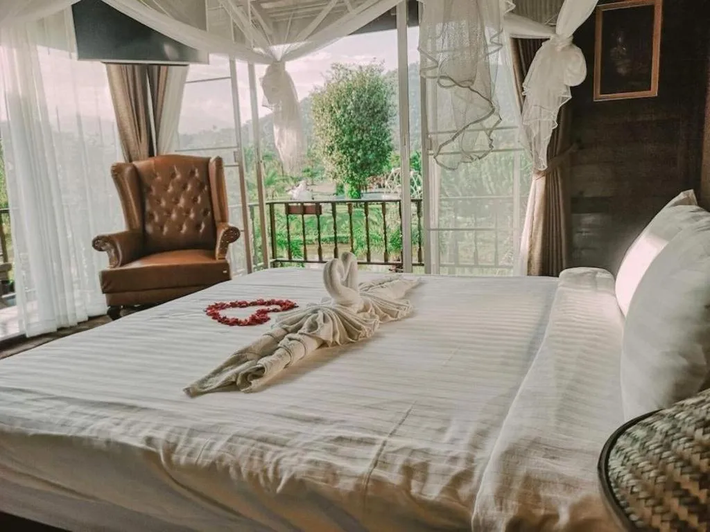 Bed in The White House Boutique Resort