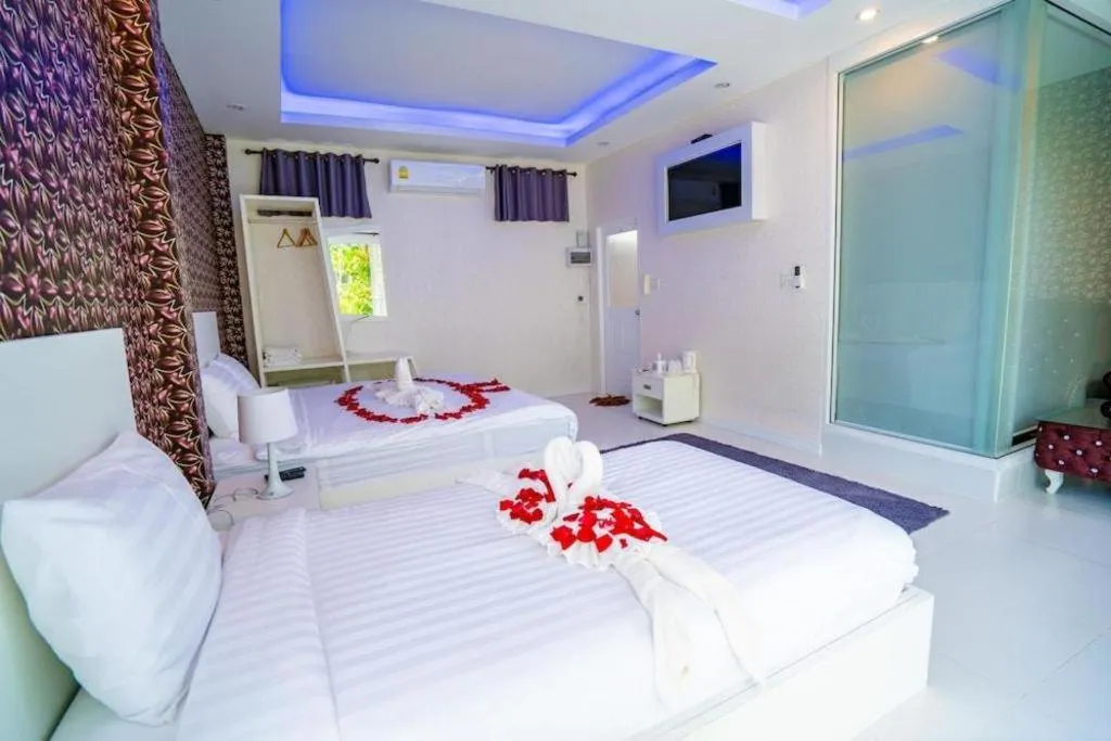 Bed in The White House Boutique Resort