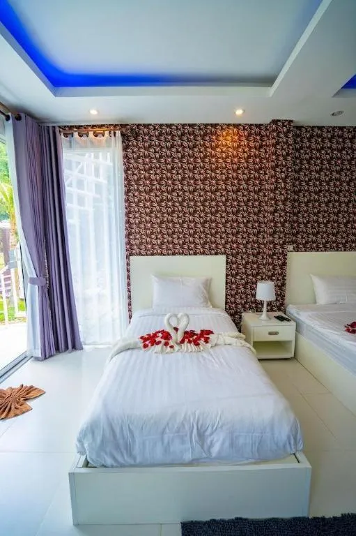 Bed in The White House Boutique Resort