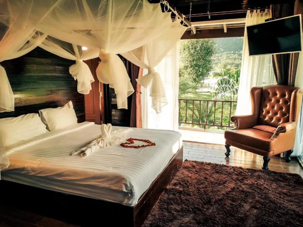Bed in The White House Boutique Resort