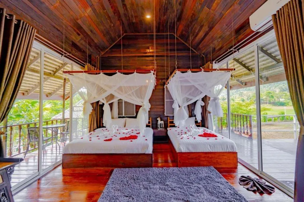 Bed in The White House Boutique Resort