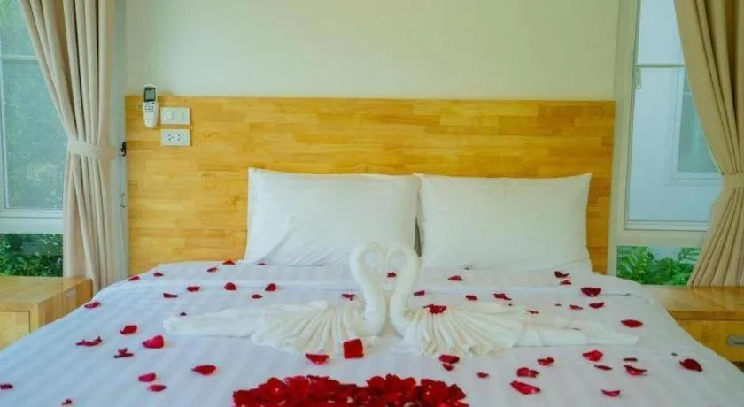 Bed in The White House Boutique Resort