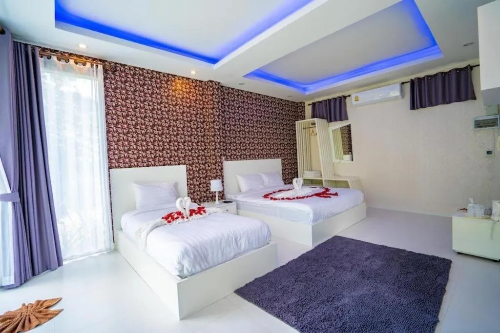 Bed in The White House Boutique Resort