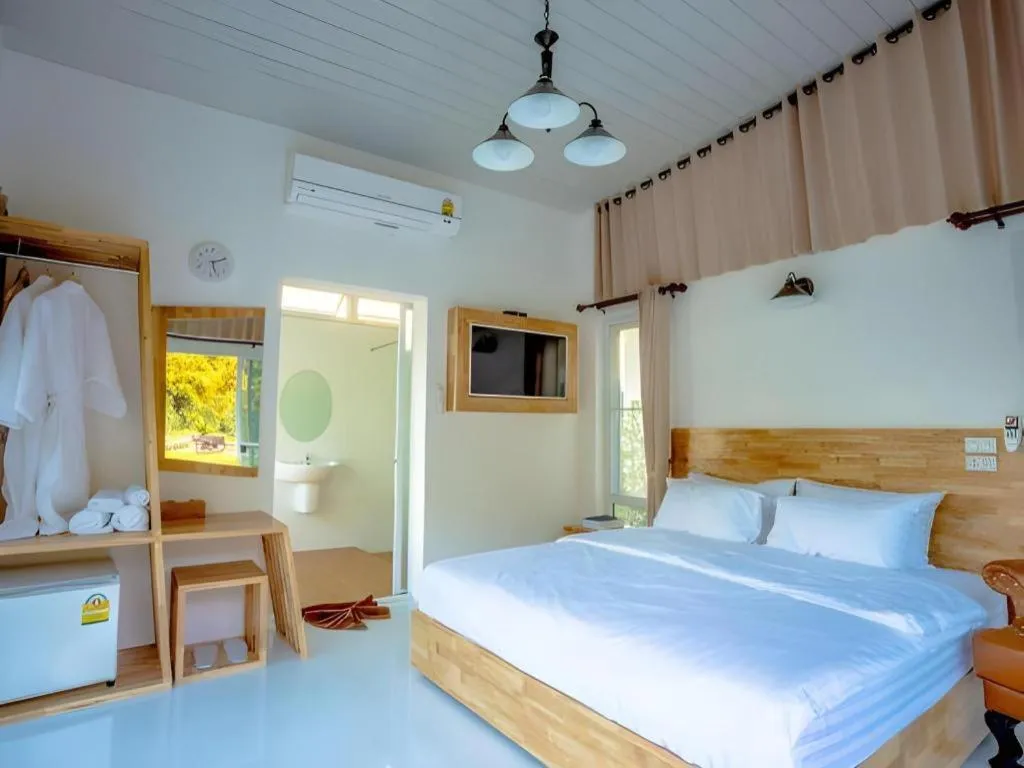 Bed in The White House Boutique Resort