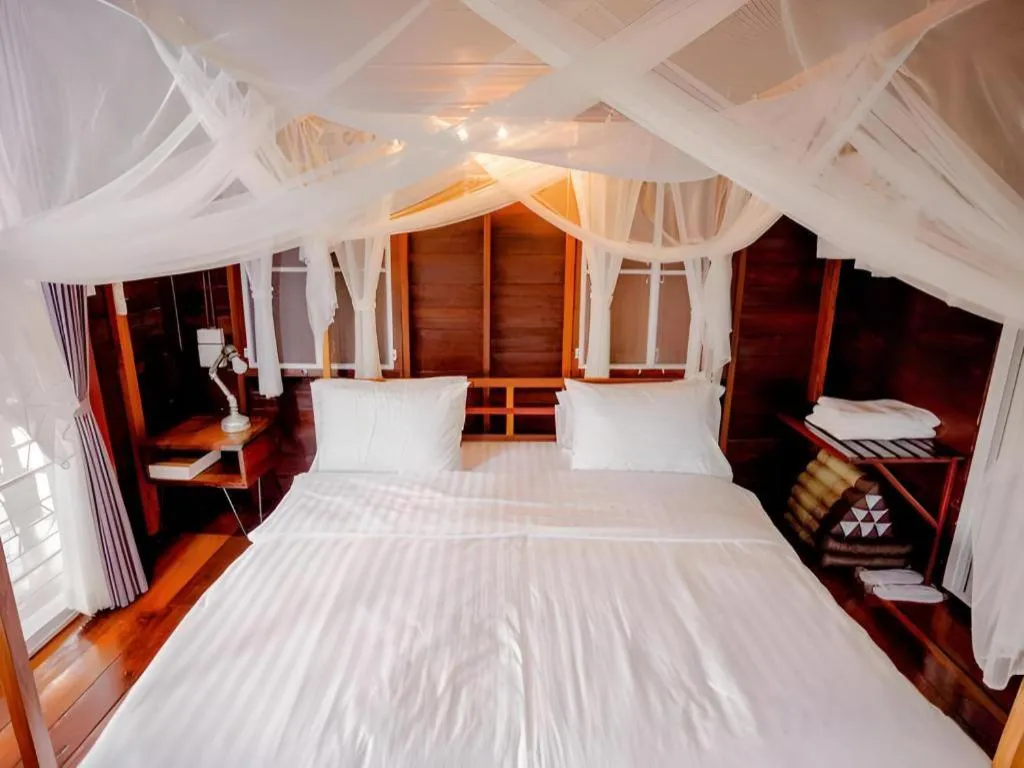 Bed in The White House Boutique Resort