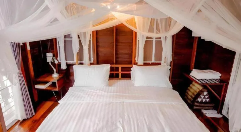 Bed in The White House Boutique Resort