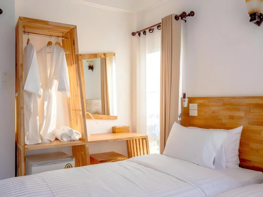 Bed in The White House Boutique Resort