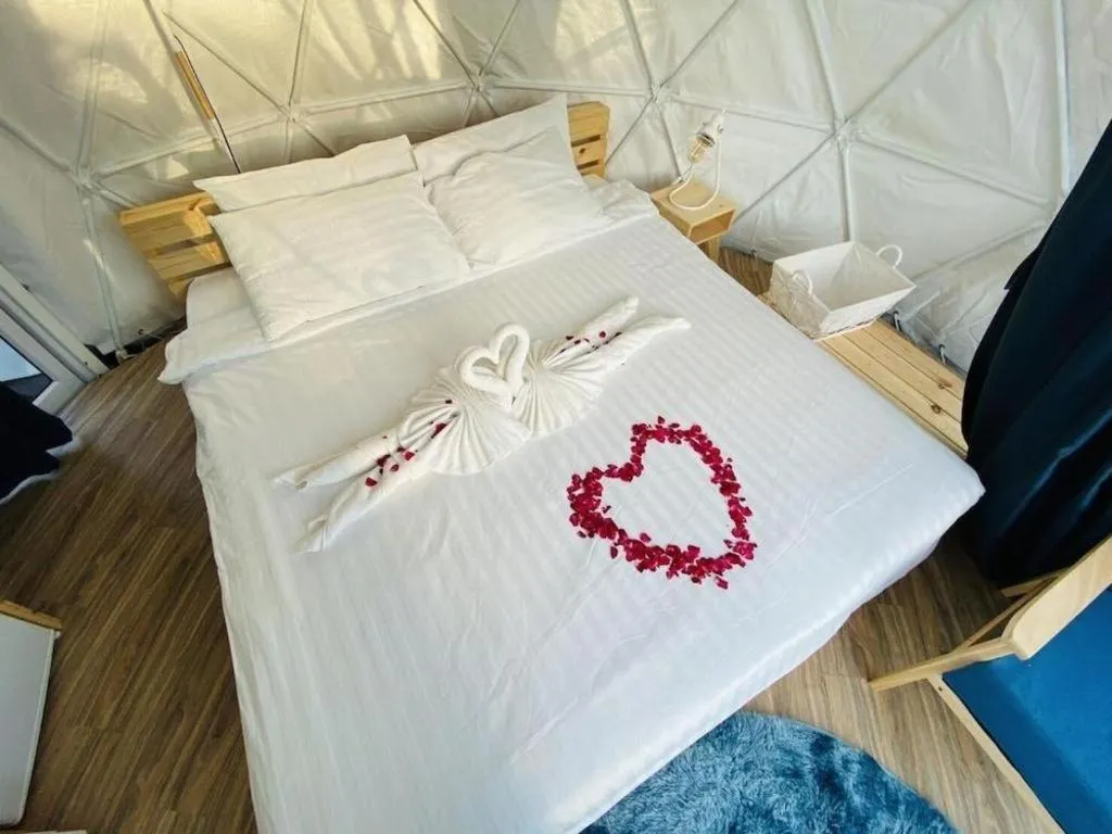 Bed in The White House Boutique Resort