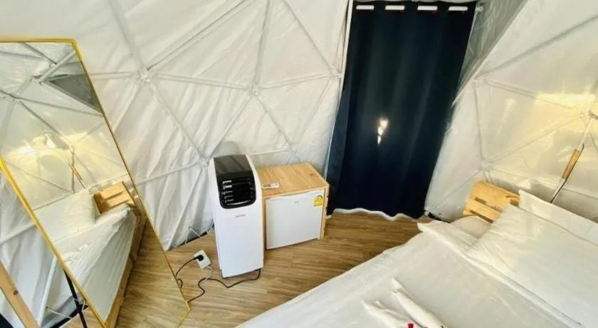 Bed in The White House Boutique Resort