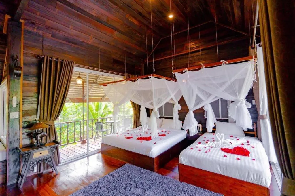 Bed in The White House Boutique Resort