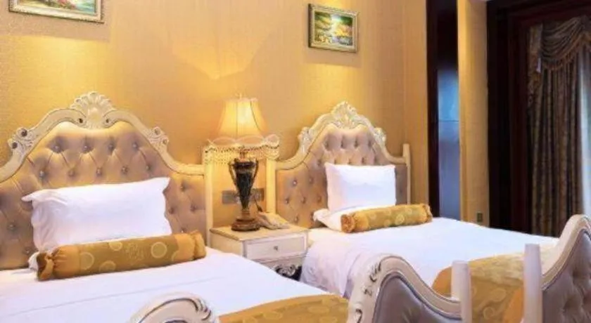 Bed in Taishan Bojue Hotel