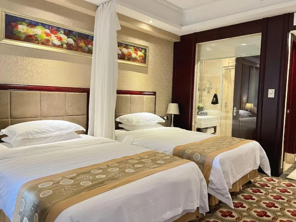 Bed in Taishan Bojue Hotel